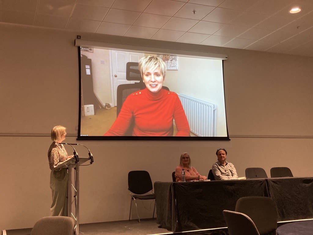 Mandy Hill on-screen, joining the event remotely