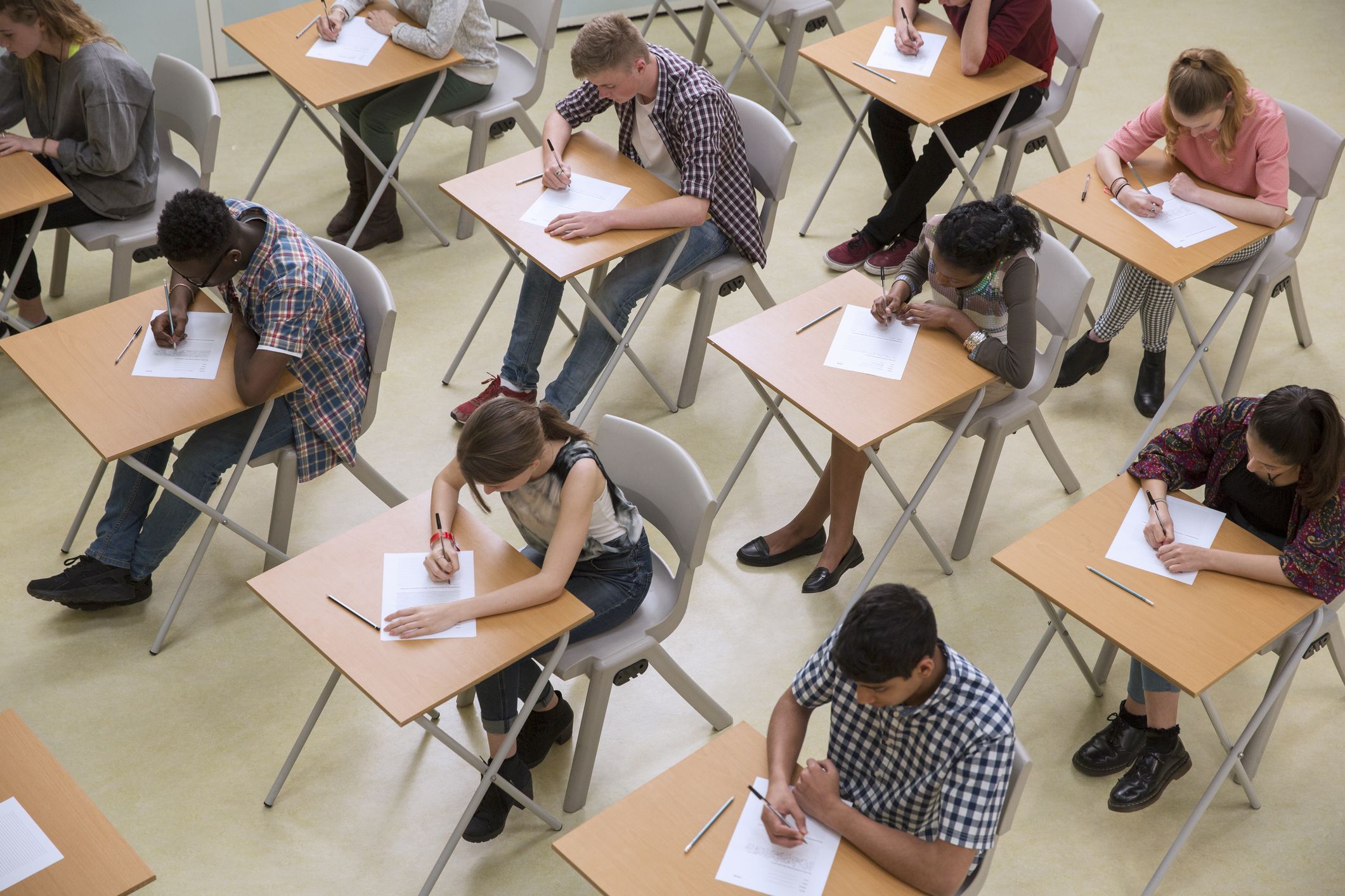 students at desks in an exam hall