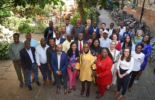 Group of edtech fellows from sub-saharan africa photographed during residential module in Cambridge