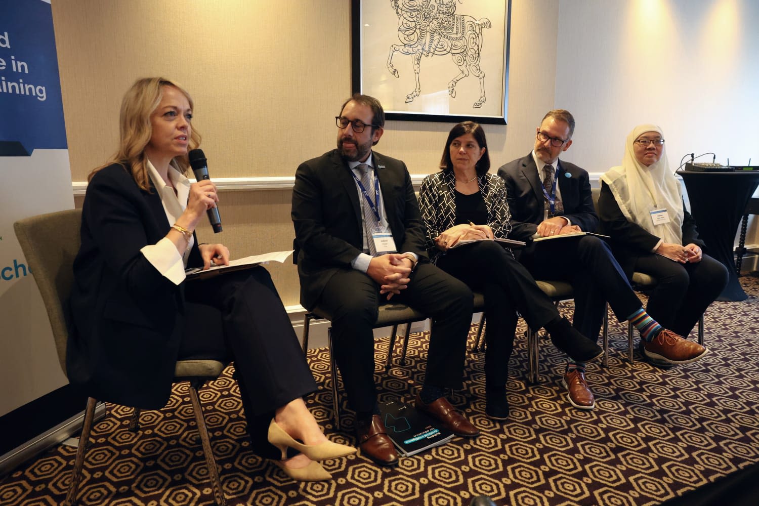 Jane Mann, Managing Director of Cambridge Parnership for Education, chairing a panel discussion at EWF 2024.